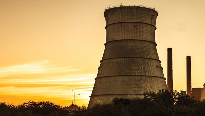 a nuclear reactor at sunset