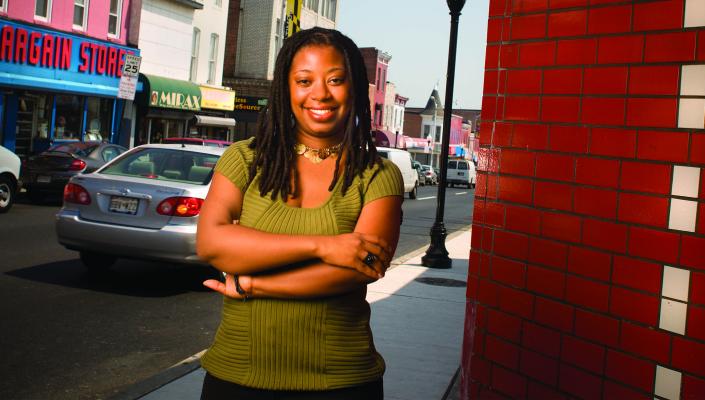 Tiffany Gary stands on a Baltimore street