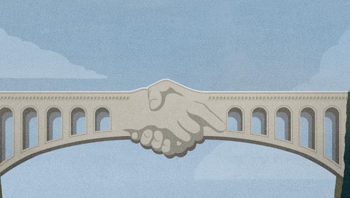 illustration of a bridge formed by two clasped hands