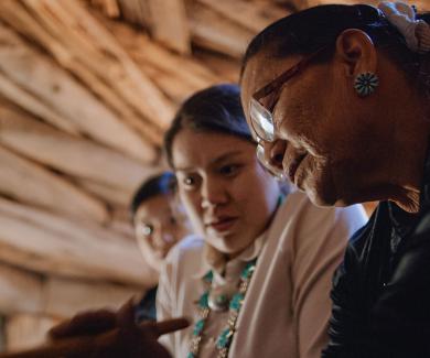 A Navajo grandmother and two teenage granddaughters