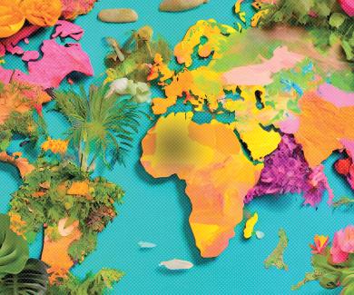 A brightly colored map of the world, covered in plants and flowers.