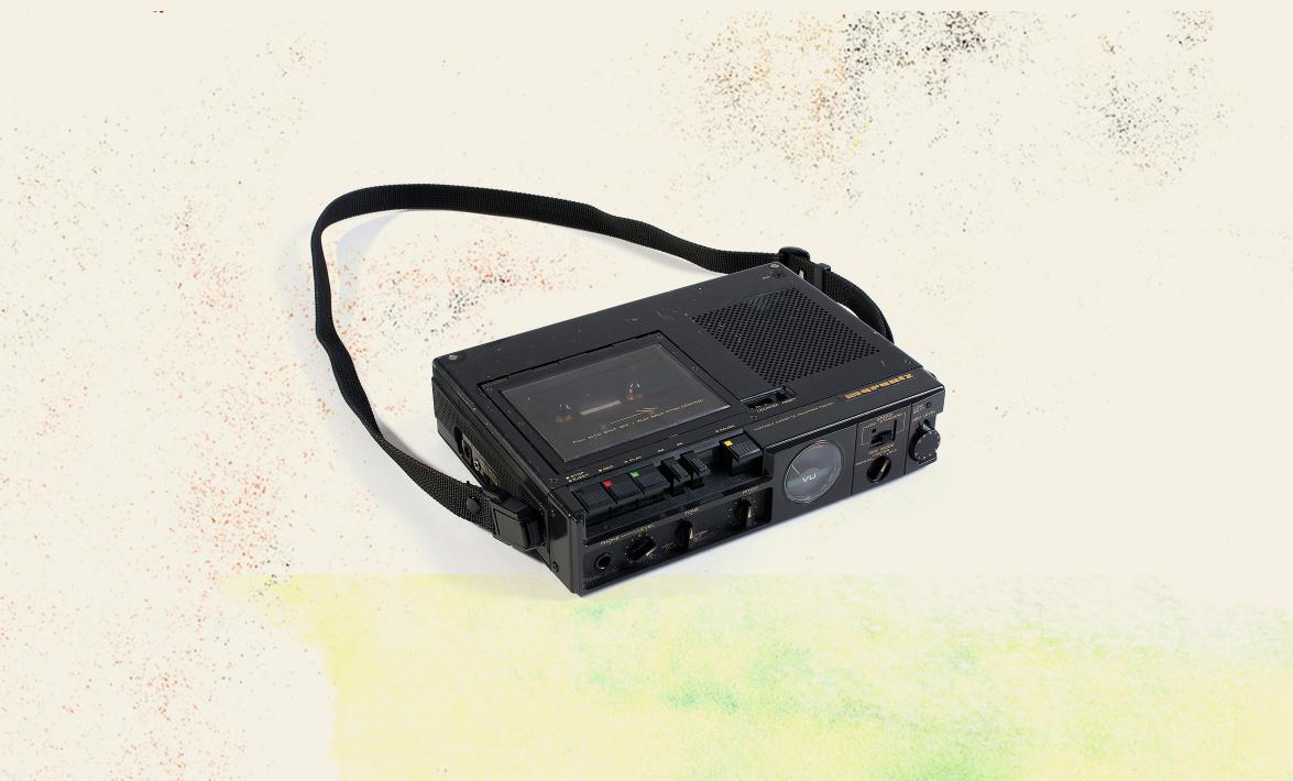 black portable cassette recorder with carrying strap
